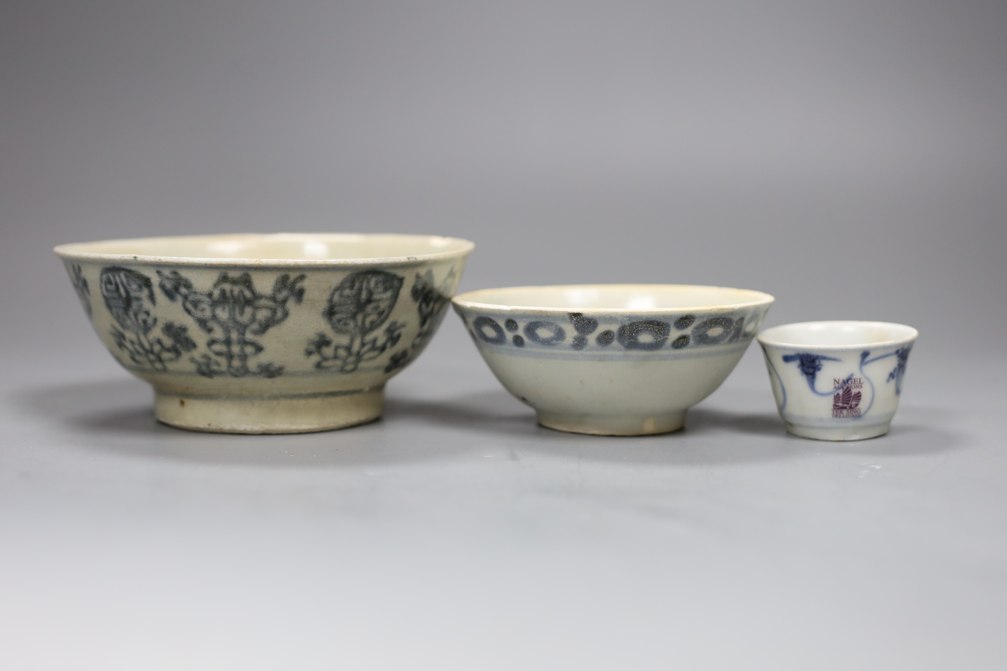 Three Chinese Tek Sing blue and white bowls and a kitchen bowl, tallest 6cm